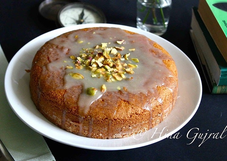Moist and delicious cardamom spiced eggless semolina cake recipe. Find how to make eggless semolina cake in few simple steps