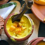 Mango Shrikhand is an Indian sweet treat made with fresh mango pulp, thick yogurt, flavored with aromatics like saffron, cardamom, and pistachio.