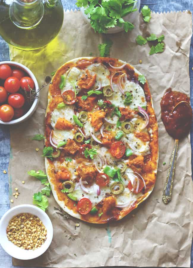 Thinking what to do with leftover naan? Make Naan Pizza out of it. You will surely thank me for this easy naan pizza recipe.