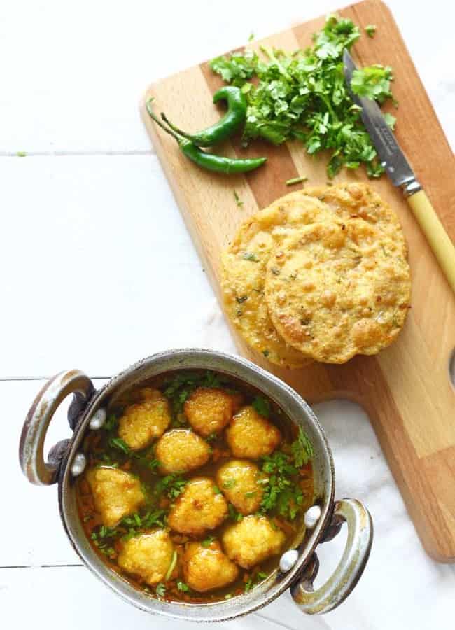 Pakodi Ki Sabzi is a delicious gluten-free, vegan yellow moong dal dumpling curry sans any onion or garlic. Super flavorsome and so simple to prepare.