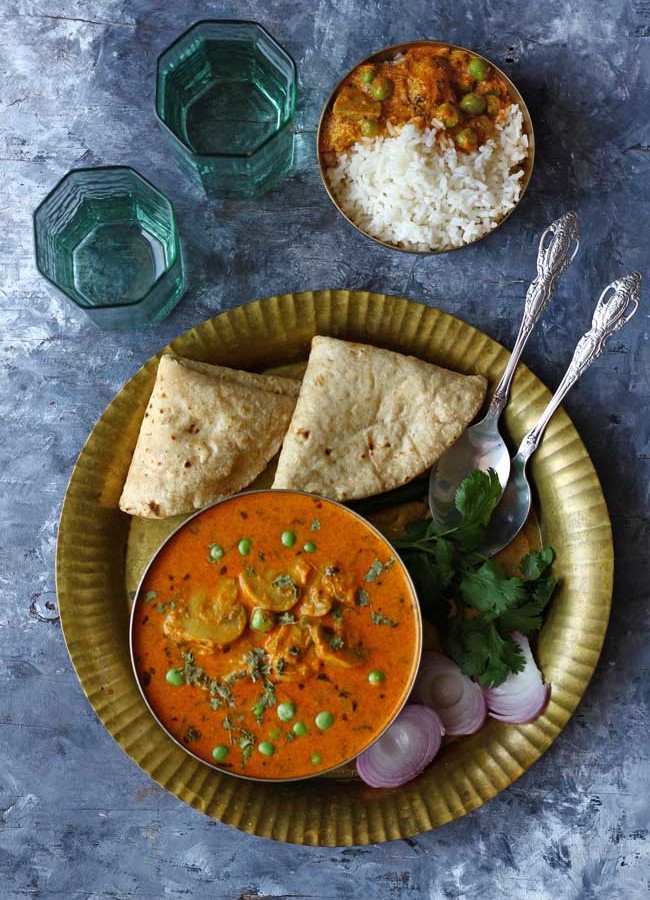 This delicious Matar Mushroom Masala recipe is easy to make, naturally gluten-free, and full of the most gratifying curry flavors.