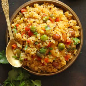 Vegetable Dalia Upma In a Brass Bowl