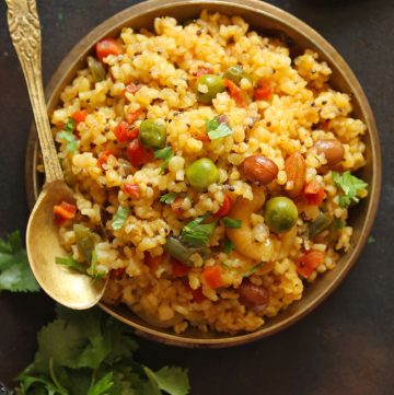 Vegetable Dalia Upma In a Brass Bowl