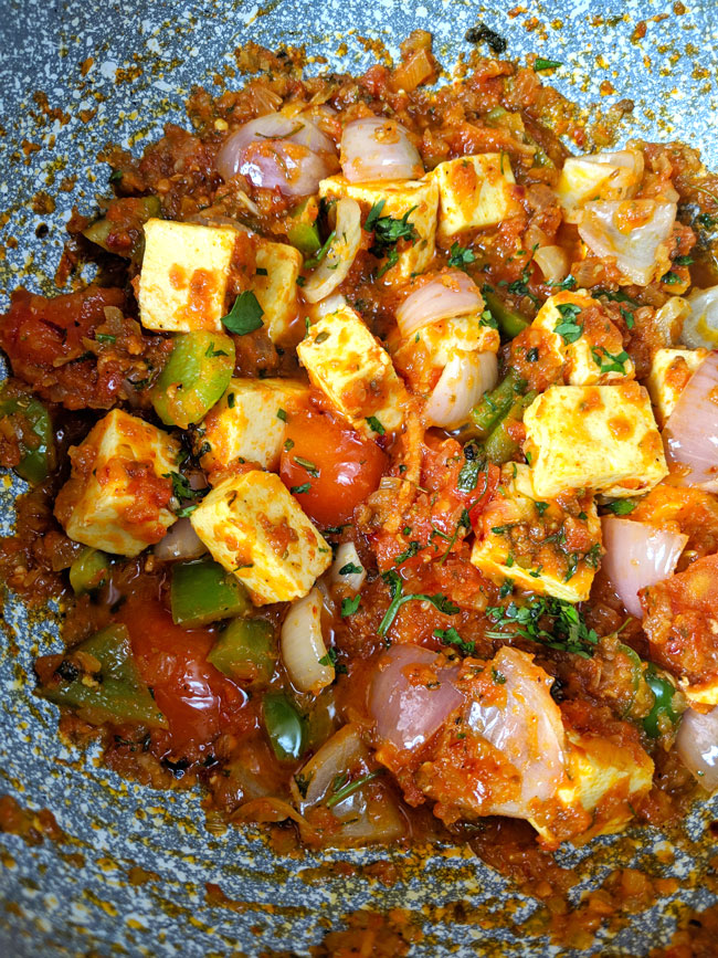 aerial shot of kadhai paneer in a kadhai