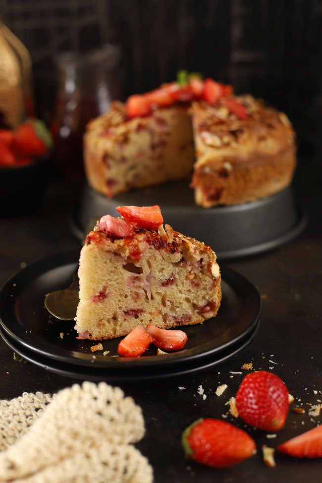 Slice of Fresh Strawberry Cake On A Black Plate