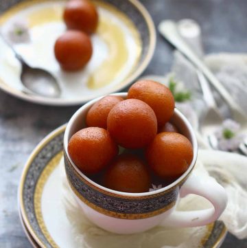 Paneer Gulab Jamun are deep fried cottage cheese dumplings soaked in sugar syrup.