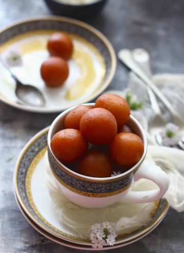 Paneer Gulab Jamun are deep fried cottage cheese dumplings soaked in sugar syrup.