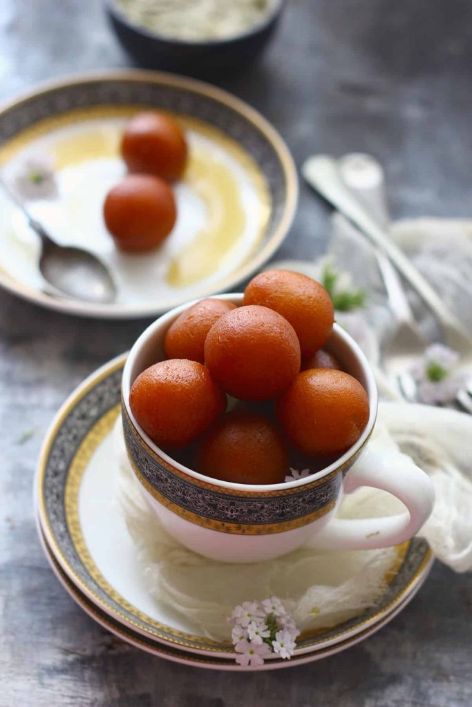 Paneer Gulab Jamun are deep fried cottage cheese dumplings soaked in sugar syrup.