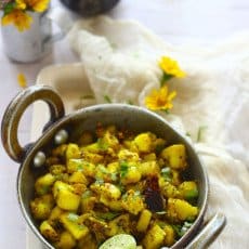Kachhe Kele Ki Sabzi is a no onion - garlic recipe prepared using raw bananas. An excellent gluten free dish.