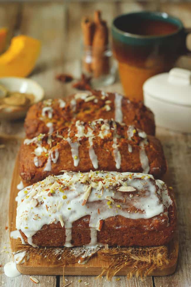 side shot of three mini pumpkin loaf cake