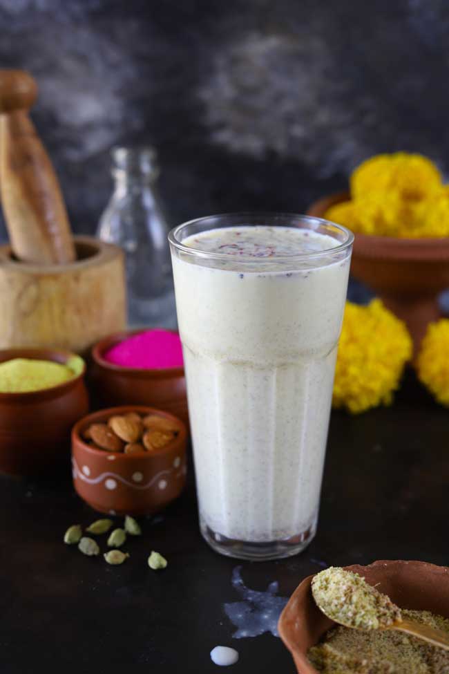 side shot of homemade thandai in a glass