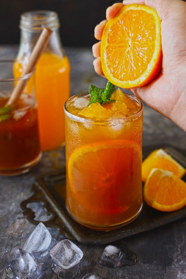 A home brewed iced tea with orange flavor