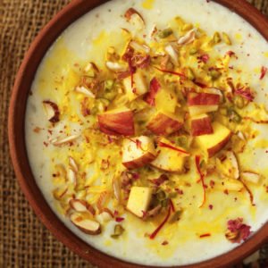 Sugar Free Apple Kheer in an earthen serving bowl.