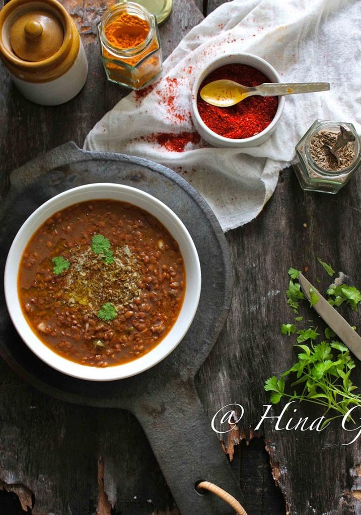 Aerial shot of Pahadi Gahat Dal in a white serving bowl on a black surface.