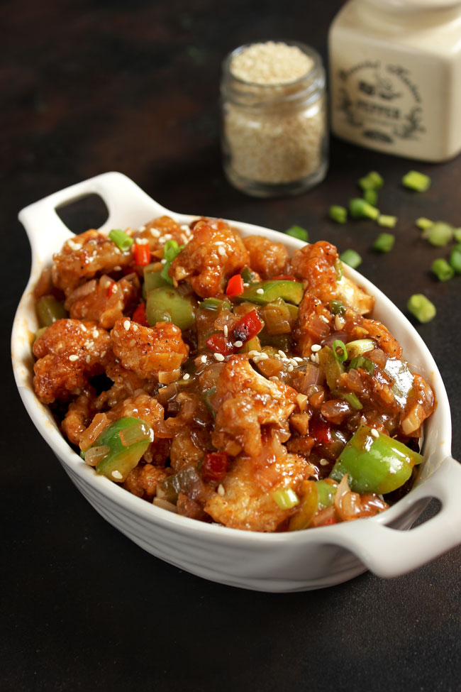 side shot of gobi manchurian in a white ceramic oval bowl