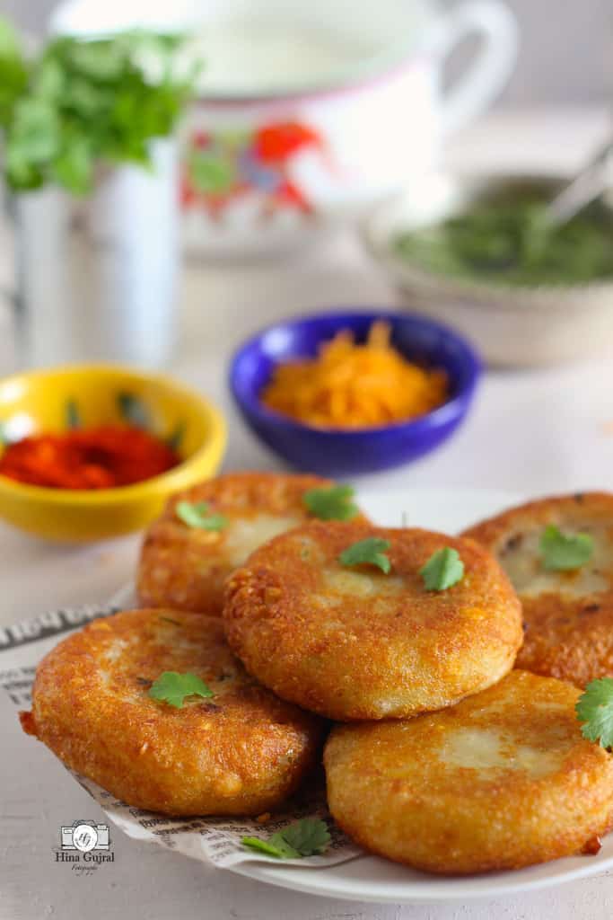 Aloo Tikki Chaat is a delicious Indian street food of crisp potato patties loaded with curd, chutney, and spices