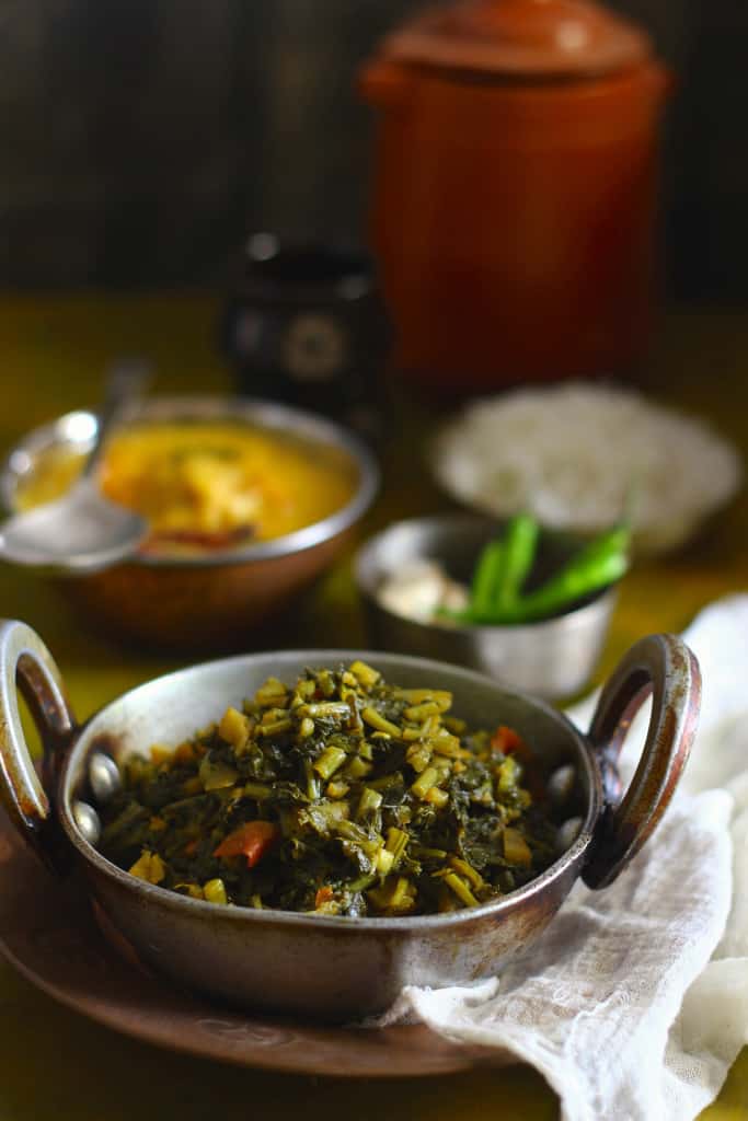 side close up shot of mooli saag in a kadhai