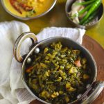 aerial shot of mooli ka saag in a kadhai