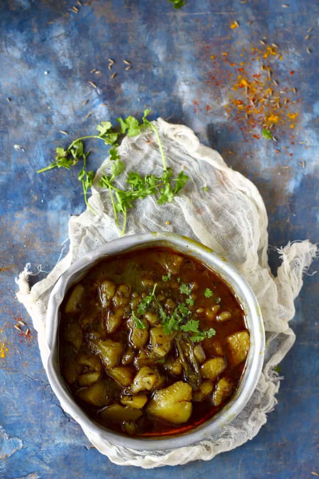 aerial shot of pahadi aloo paani in a vintage serving bowl