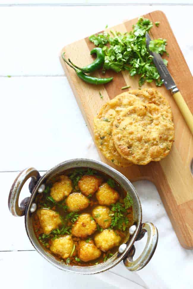 Pakodi Ki Sabzi is a delicious gluten-free, vegan yellow moong dal dumpling curry sans any onion or garlic. Super flavorsome and so simple to prepare.