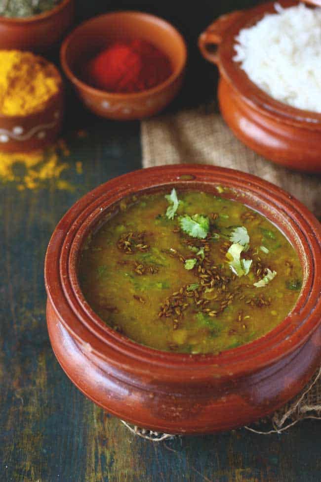 side shot of arhar dal fry in a earthen cookware pot.