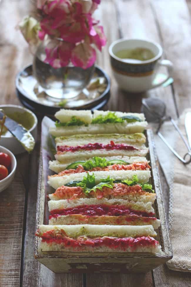 Teatime Sandwiches are the best menu choices for the summer tea party. Find how to make rainbow teatime sandwich in few simple steps