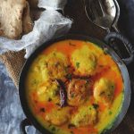 Kadhi Pakora is a gluten-free Indian curry prepared with gram flour and yogurt (curd).