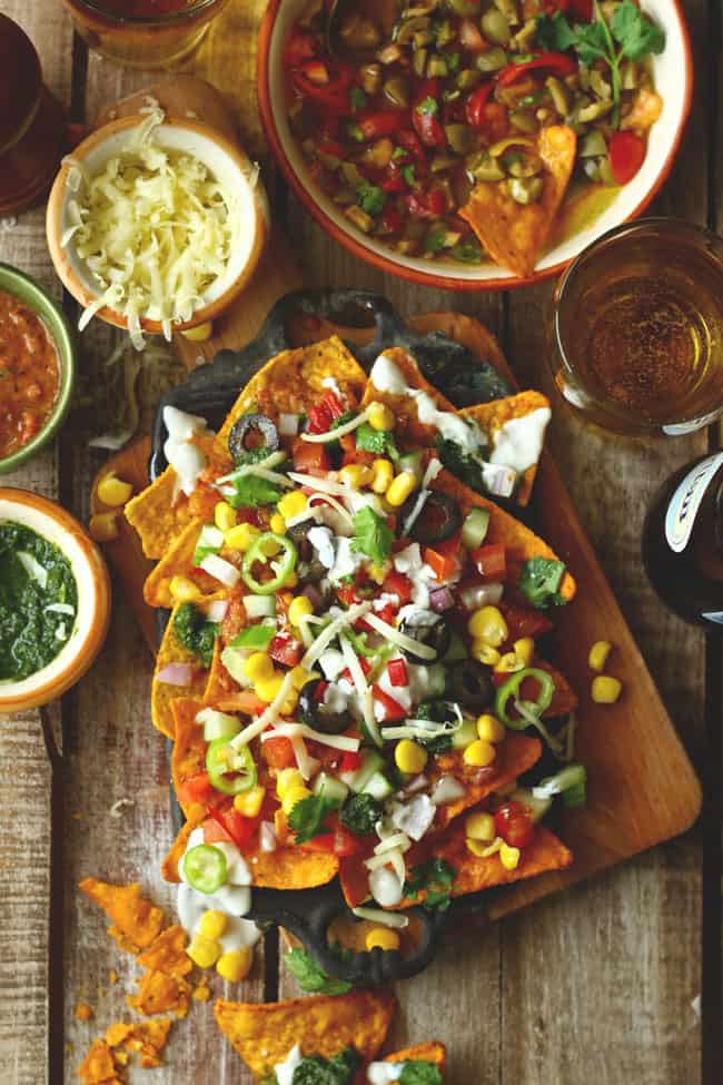 aerial shot of loaded veggies nachos on a platter