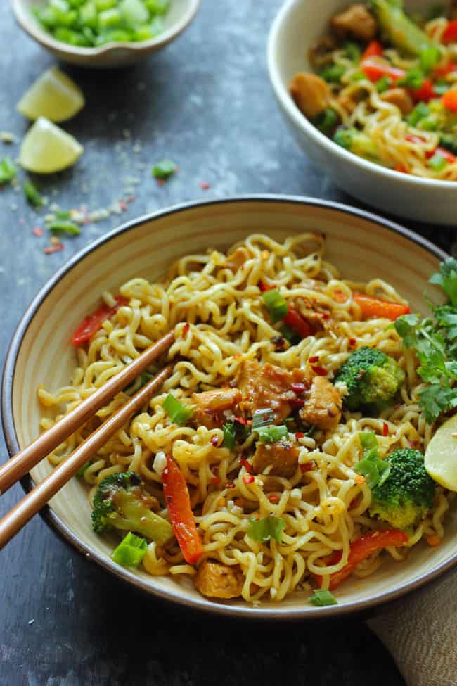 side close up shot of chicken Maggi in a ceramic bowl