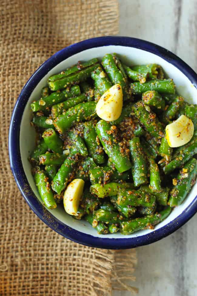 aerial shot of chilli pickle in a white bowl