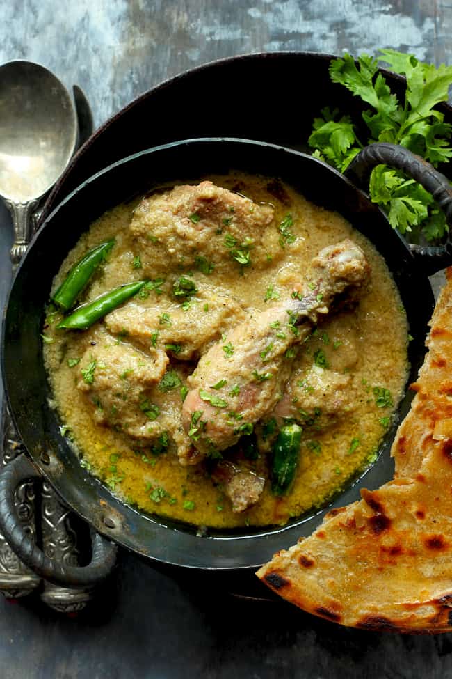 aerial shot of Indian chicken korma curry in a kadhai