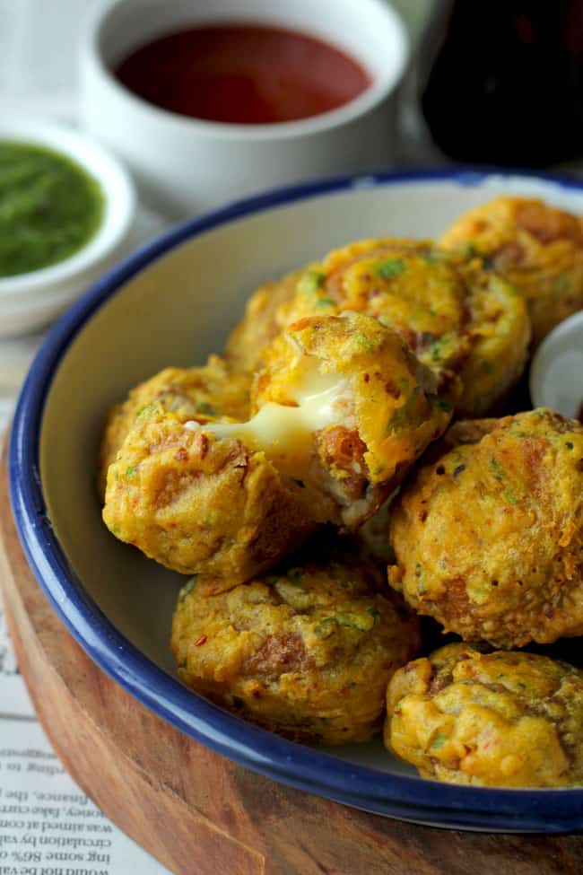 The cheese golgappa pakora is the masala potato stuffed Indian style fritters loaded with cheese.