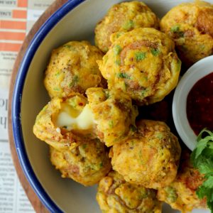 The cheese golgappa pakora is the masala potato stuffed Indian style fritters loaded with cheese.