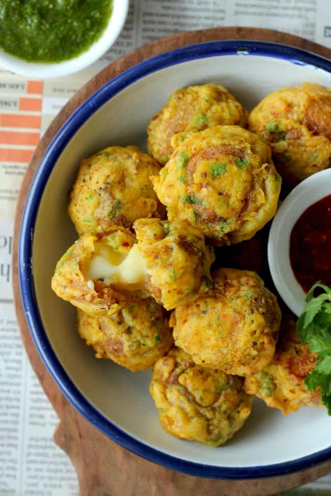 The cheese golgappa pakora is the masala potato stuffed Indian style fritters loaded with cheese.