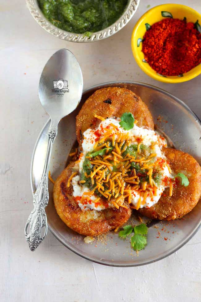Aloo Tikki Chaat is a delicious Indian street food of crisp potato patties loaded with curd, chutney, and spices
