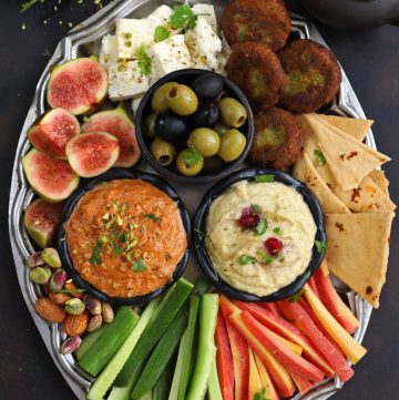 aerial shot of mezze platter on a black surface