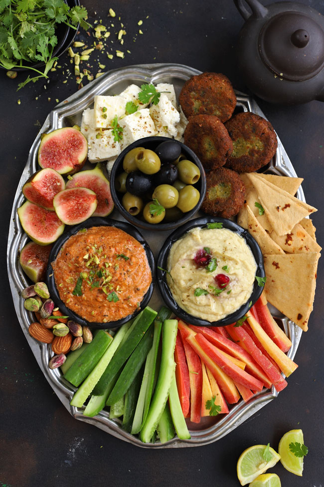 aerial shot of mezze platter on a black surface