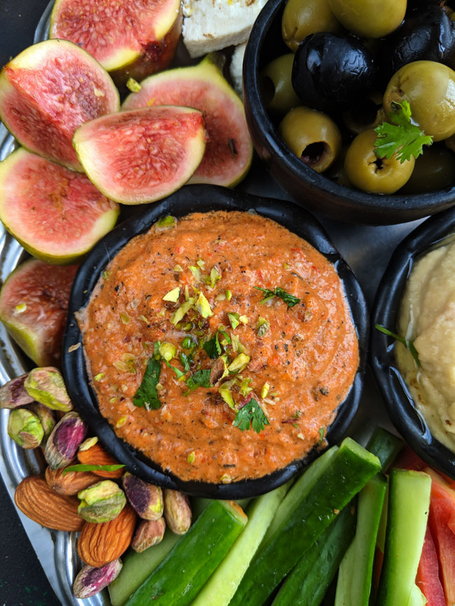 aerial close up shot of hummus in a mezze platter