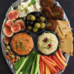 aerial shot of mezze platter on a black surface