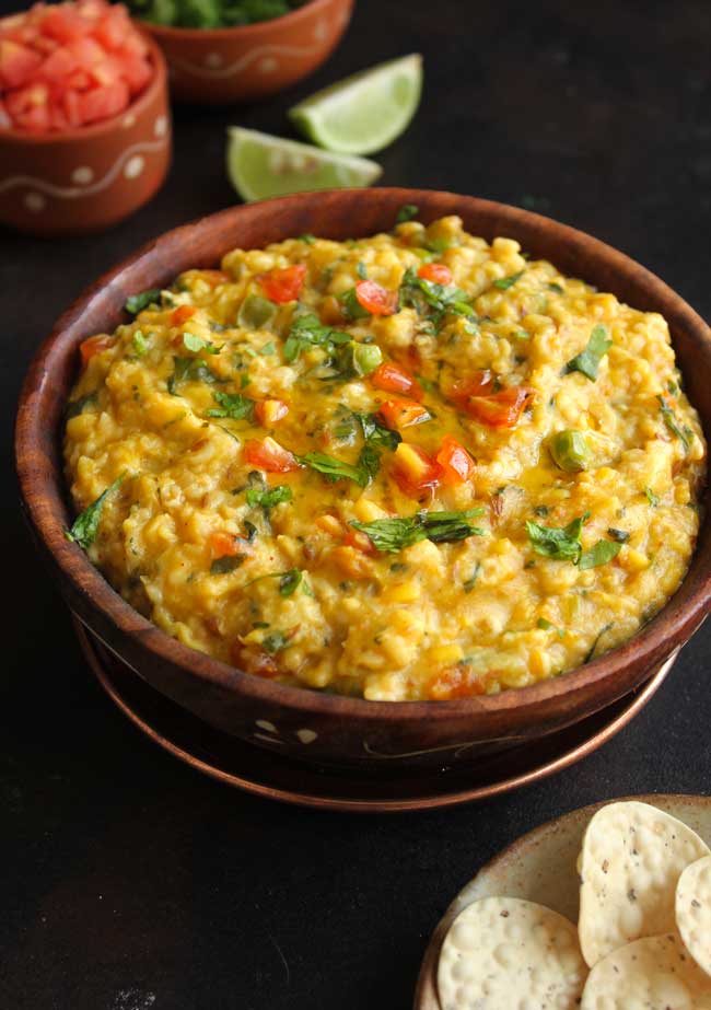 Oats Khichdi In a Brown Bowl