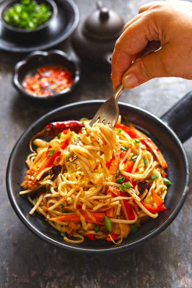 Chilli Garlic Noodles is a spicy, Indian Chinese style noodles stir-fry with loads of vegetables.