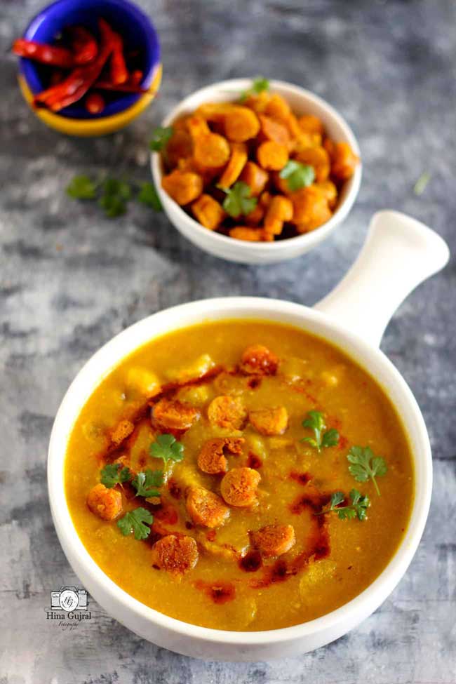 Gatte Ki Sabzi is a popular gluten-free Indian curry prepared with gram flour (besan) and curd.