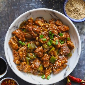 Chilli Chicken is a spice-rich, Indian Chinese style stir-fry chicken.