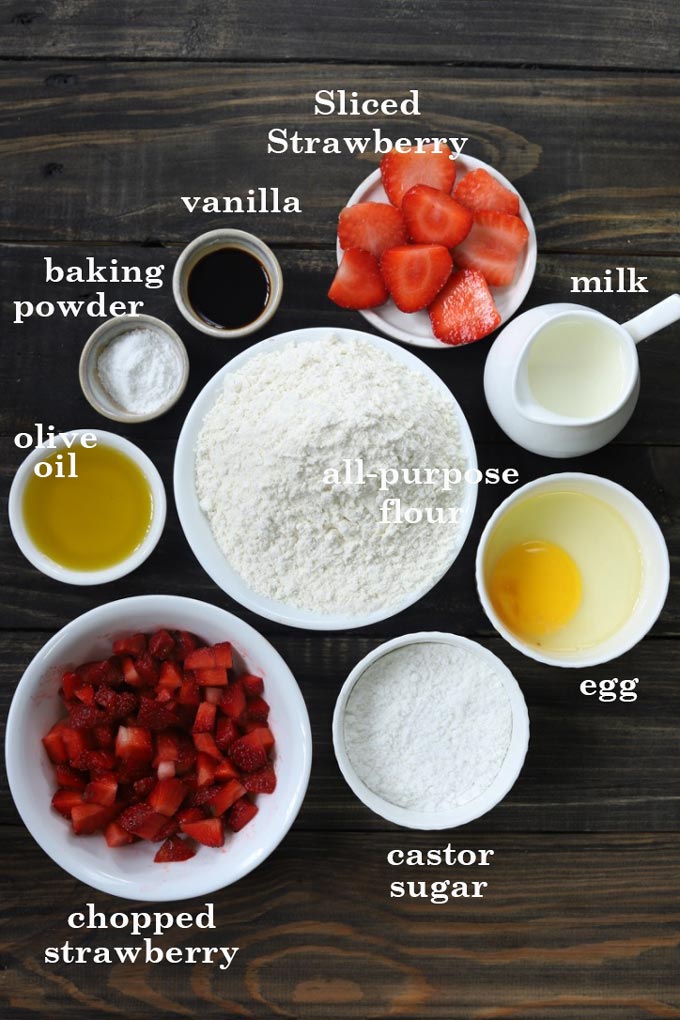 Strawberry Cake Ingredients - Flour, White Sugar, Baking Powder, Strawberry Chopped & Sliced, Egg, Milk, Vanilla, Olive Oil