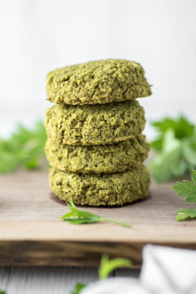 Lentil falafel stacked in a brown surface