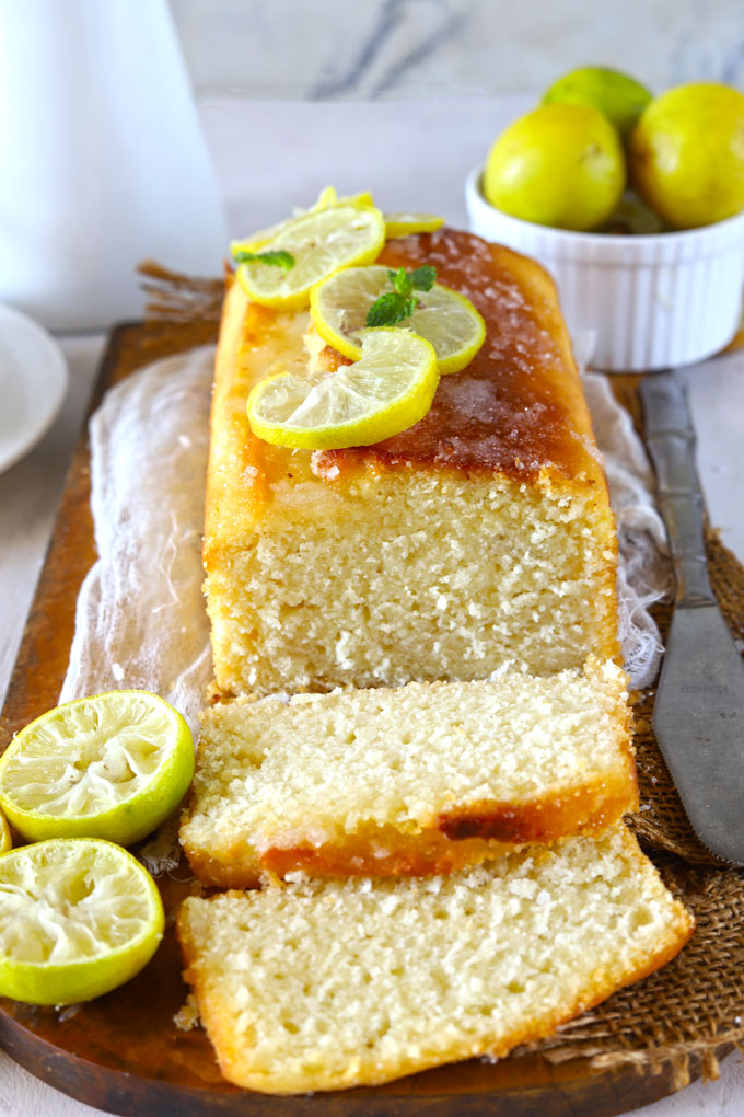 Side shot of sliced lemon pound cake loaf