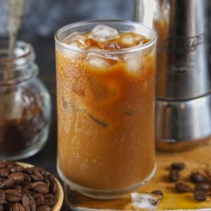 Side shot of Vietnamese iced coffee in a glass.