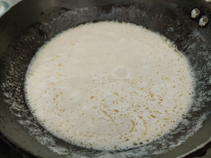 Cooking step of paneer in white gravy
