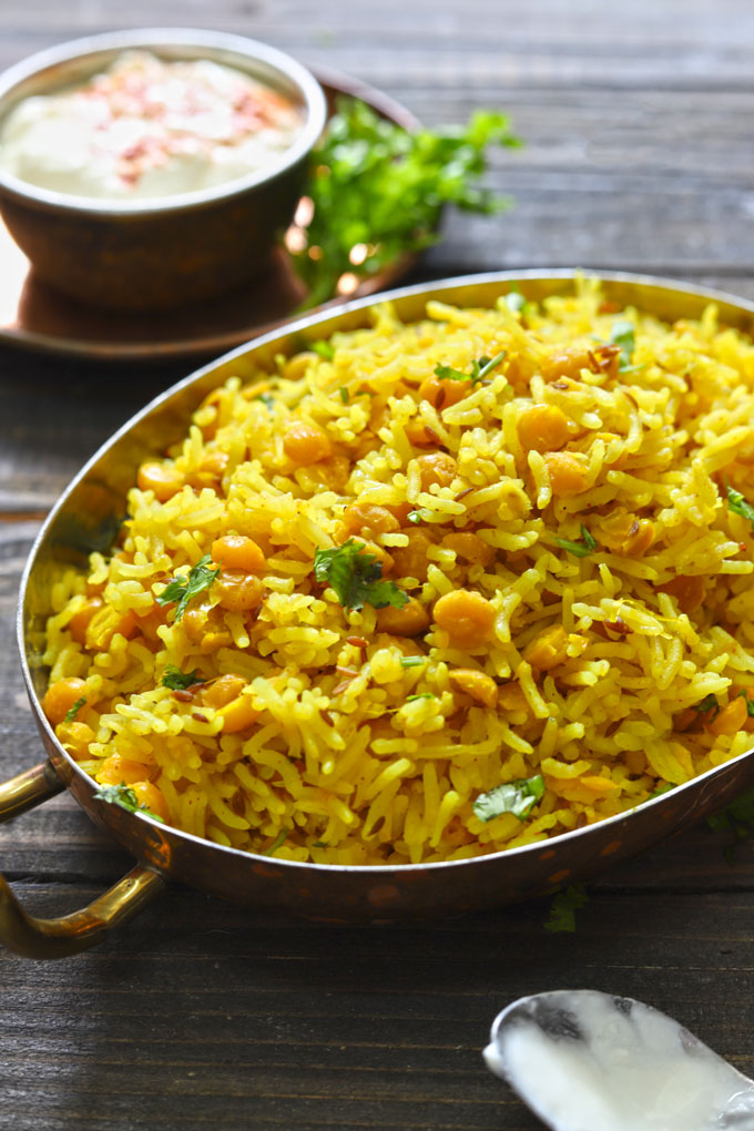 side shot of chana dal pulao in a serving platter