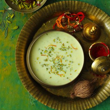 aerial shot of lauki kheer in a brass serving bowl